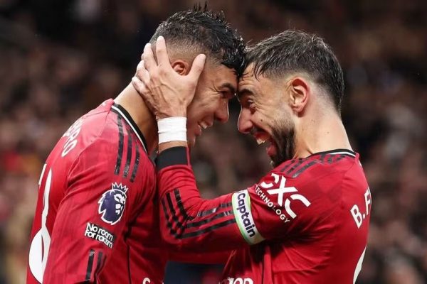 Casemiro heads in Manchester United’s second goal against Chelsea before receiving a red card in rain-soaked Old Trafford thriller.