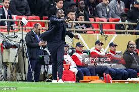 Senegal head coach Pape Thiaw on the sidelines during the Africa Cup of Nations final match against Morocco at Prince Moulay Abdellah Stadium.