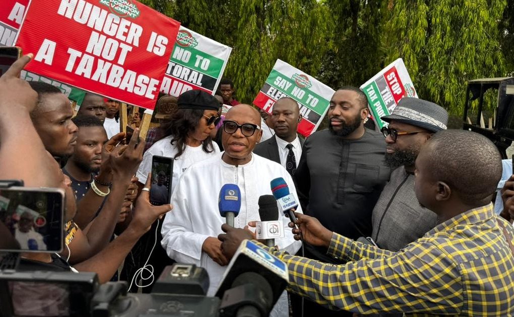 ormer Minister of Transportation and ex-Rivers State Governor Rotimi Amaechi speaking to protesters outside the National Assembly complex in Abuja during demonstrations demanding mandatory real-time electronic transmission of election results.