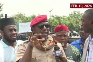 Former Minister of Youth and Sports Development Solomon Dalung speaking to protesters outside the National Assembly complex in Abuja during demonstrations demanding mandatory electronic transmission of election results in the Electoral Act Amendment Bill.