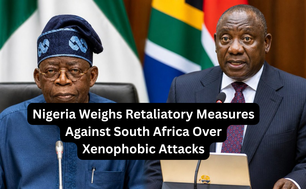Nigerian protesters holding placards demanding government action against xenophobic attacks in South Africa, gathered outside a South African retail store in Lagos.