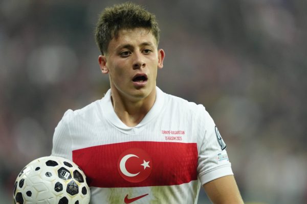 Real Madrid midfielder Arda Güler and Bayern Munich winger Michael Olise during football action, highlighting transfer speculation linking Olise with a move to the Spanish giants.